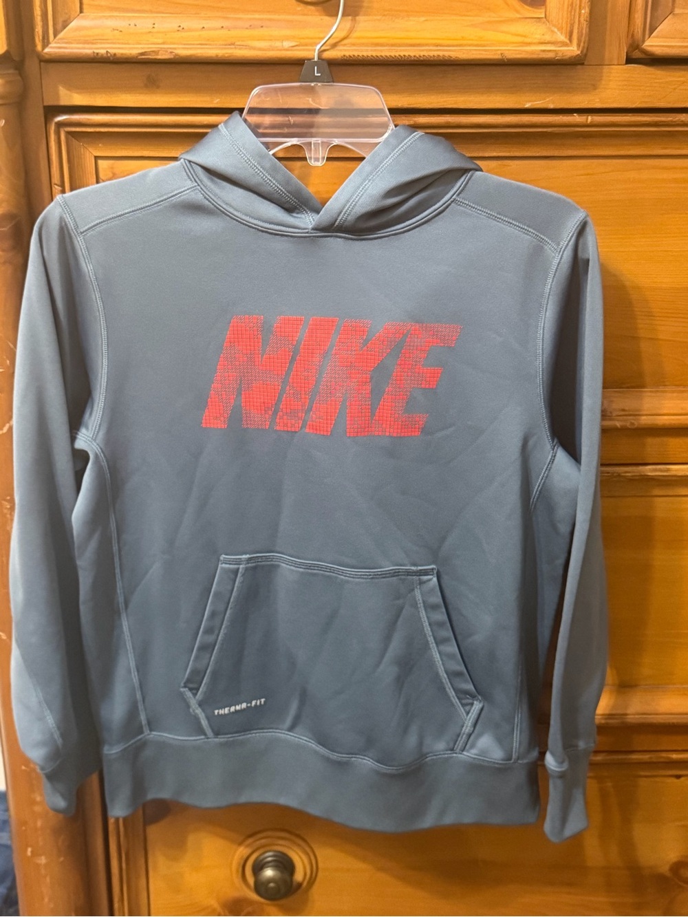 Youth Nike Grey Hooded Sweatshirt with Red Logo